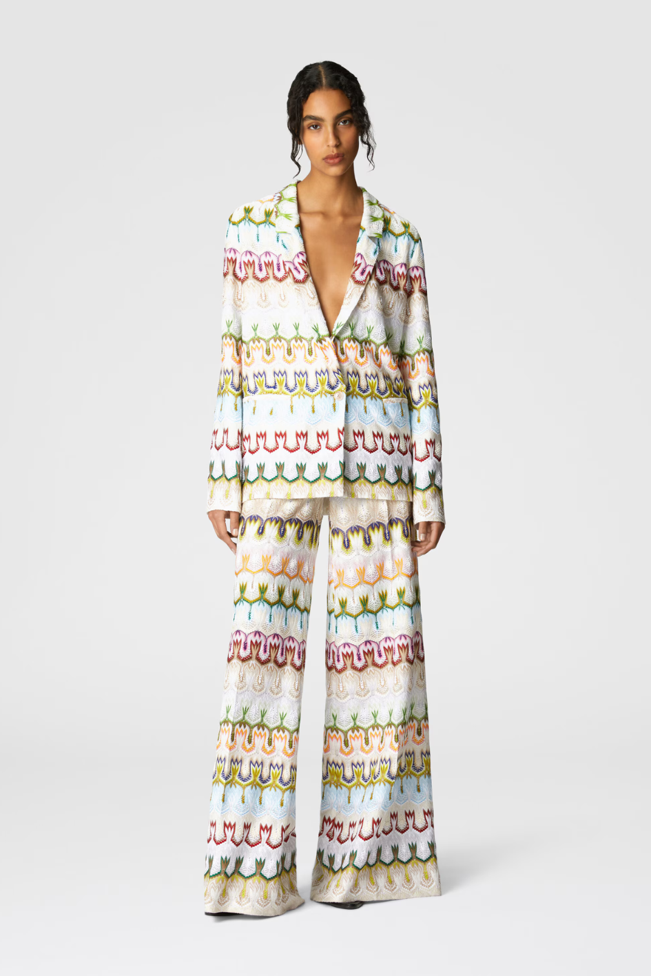 Long trousers with a high waist and abstract floral pattern