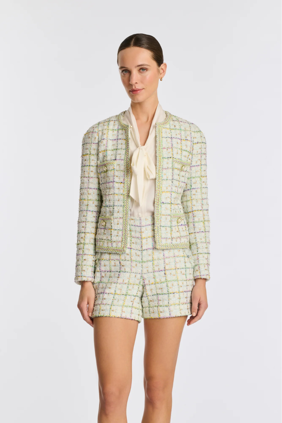 Pastel tweed jacket with braided trim